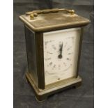 A brass cased carriage clock, the eight day movement by Ouverdrey et Bloquel,