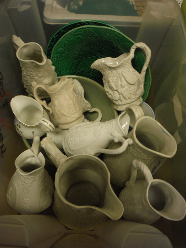 Seven boxes of assorted decorative china wares to include Portmeirion Parian ware style jugs,