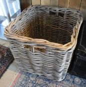 A large wicker log basket,
