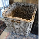 A large wicker log basket,