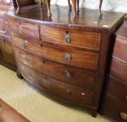 A Regency mahogany bow fronted chest with two short over three long graduated drawers with brass