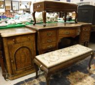 A Victorian burr oak bow front dressing table with eight assorted drawers and united undertier,