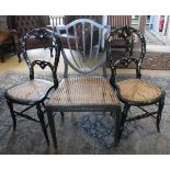 A pair of 19th Century Victorian balloon back and mother of pearl inlaid cane seated bedroom chairs,