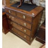 A 19th Century North Country English oak and cross banded chest of two short over three long