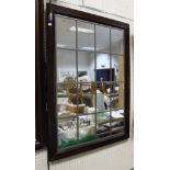 A multi-plate rectangular wall mirror with applied moulded decoration to the corners