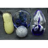 Assorted paperweights to include example by Jane Charles with blue and green swirled decoration,