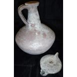 A Roman terracotta jug,