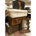 A black leather covered and iron bound pine chest, a metal cream painted trunk,