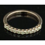 A 9 carat rose gold half eternity ring