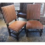 A pair of oak framed hall chairs in red and yellow striped upholstery, with barley twist stretcher,