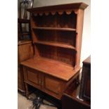 An early 20th Century oak dresser,