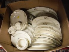 Two boxes containing a Continental part dinner service,