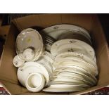 Two boxes containing a Continental part dinner service,