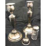 A pair of silver candlesticks (Edward Barnard & Sons Ltd London 1909),