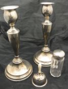 A pair of silver candlesticks (Edward Barnard & Sons Ltd London 1909),