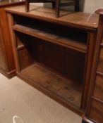 A Victorian oak open bookcase with adjustable shelving on a plinth base CONDITION REPORTS