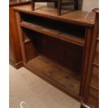 A Victorian oak open bookcase with adjustable shelving on a plinth base CONDITION REPORTS