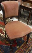 A set of six Victorian mahogany framed upholstered dining chairs