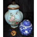 A Chinese cloisonné lidded vase of lobed form,