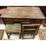 A late 19th Century oak five drawer dressing table,