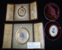 Three leather cased vintage tinted photographs,