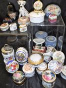 A large quantity of assorted pill pots, trinket pots, miniature jugs and vases,