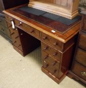 A late Victorian double pedestal mahogany desk,