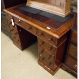 A late Victorian double pedestal mahogany desk,