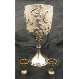 A late 19th Century silver and embossed goblet of large proportions with scroll decoration (Walter