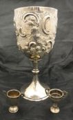 A late 19th Century silver and embossed goblet of large proportions with scroll decoration (Walter