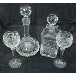 A large suite of glass ware with etched star design to include eight wine glasses,