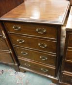 A reproduction mahogany chest of four graduated drawers,