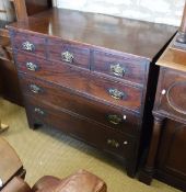 A 19t Century mahogany chest of three short over three long drawers on bracket feet