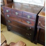 A 19t Century mahogany chest of three short over three long drawers on bracket feet