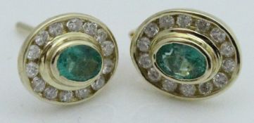 A pair of 9 carat gold emerald and diamond ear studs
