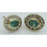 A pair of 9 carat gold emerald and diamond ear studs