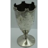 A silver vase with swag decoration to the top and knop to the stem and circular base (Birmingham