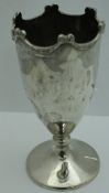 A silver vase with swag decoration to the top and knop to the stem and circular base (Birmingham