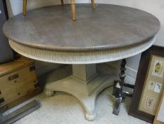 A 20th Century circular dining table, on a white and grey painted base,