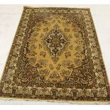 Three various rugs, each with floral set central medallion on a mustard ground,