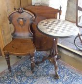 A 19th Century mahogany and inlaid fire screen, a walnut centre table with chessboard inlaid top,