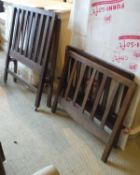 An Arts and Crafts style oak single bedstead,