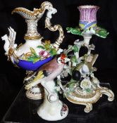 A Coalport decorative ewer with gilt and floral encrusted decoration, the handle formed as a maiden,