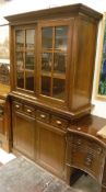 A 20th Century cherry wood dresser with moulded pediment,