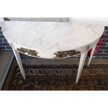 A pair of demi-lune side tables with faux painted marble top,