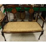 An Edwardian mahogany and inlaid two seat settee to cabriole front legs