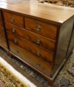 An early 20th Century mahogany chest of two short over three long drawers,