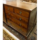 An early 20th Century mahogany chest of two short over three long drawers,