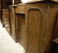 A 19th Century mahogany serpentine fronted sideboard with single drawer above cupboard door flanked