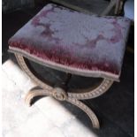 A 19th Century dressing stool with red floral upholstered seat and gilt decoration,